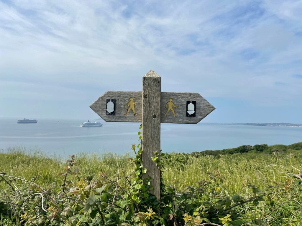 Coastal path arrow sign