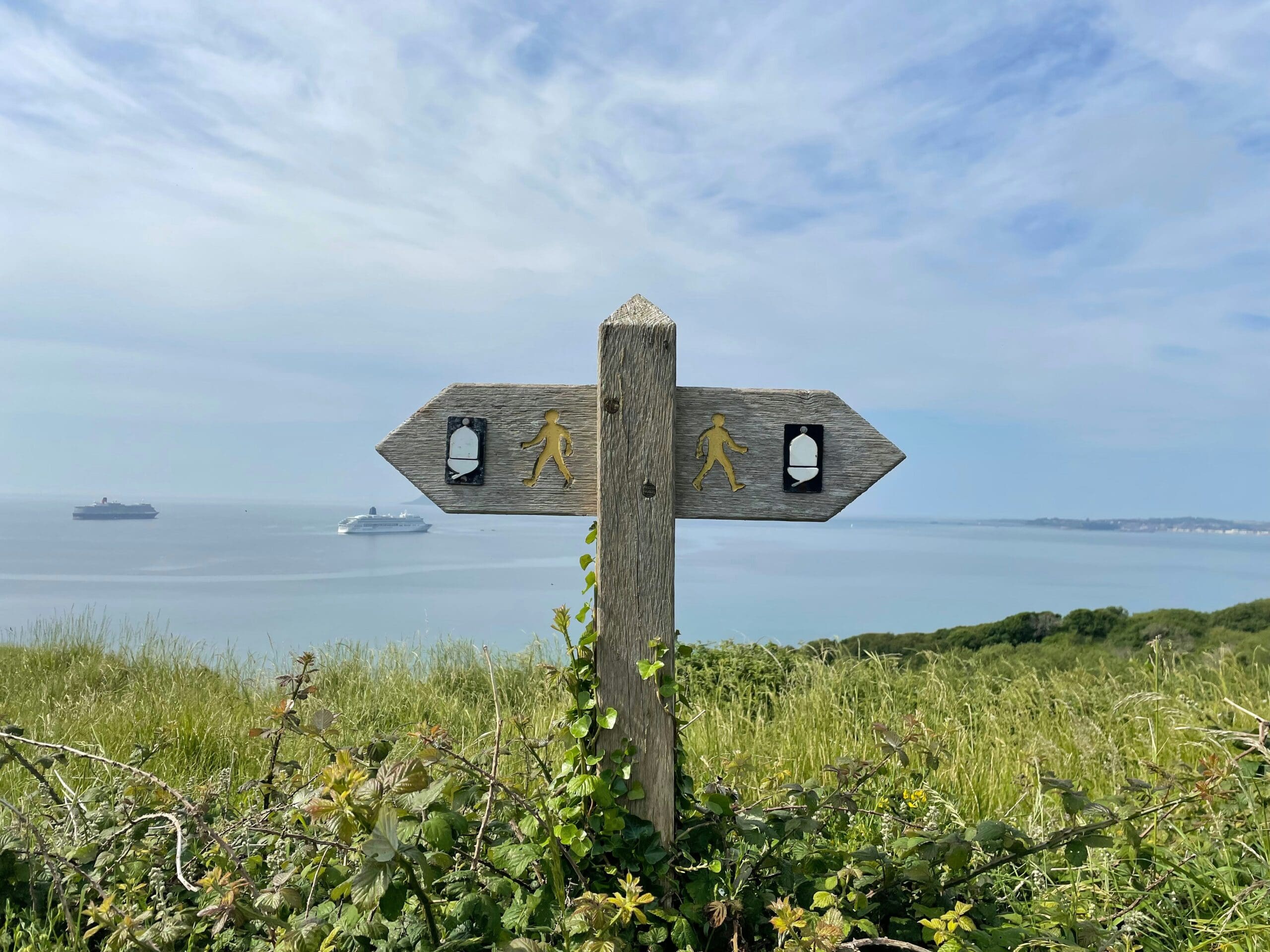 Coastal path arrow sign